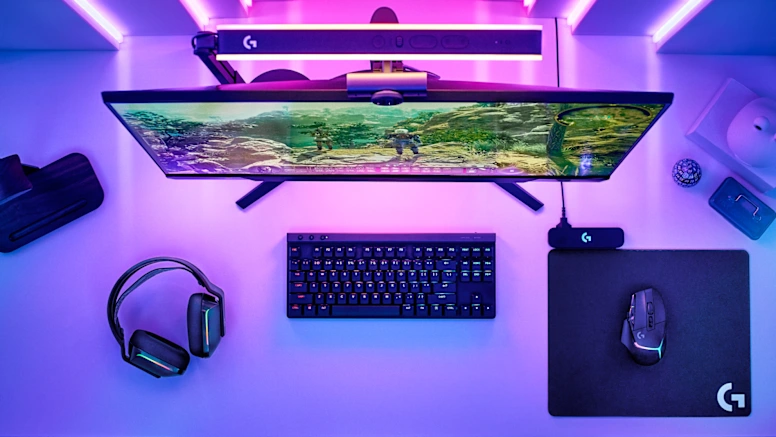 LIGHTSYNC gaming desk with synchronized keyboard, mouse and headset lighting